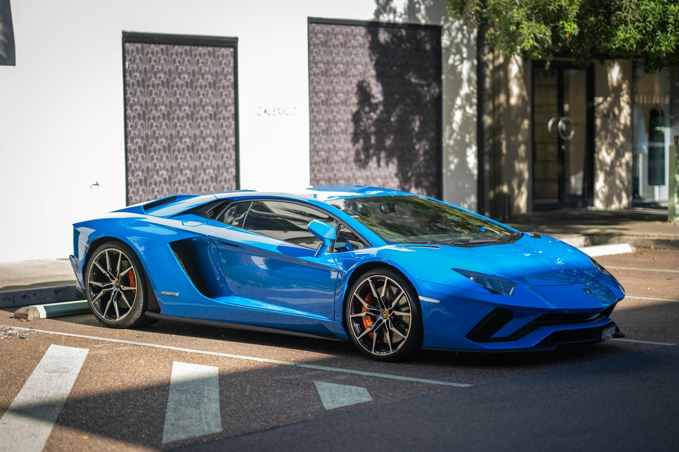 Blue Lamborghini Aventador S with a flawless, glossy finish